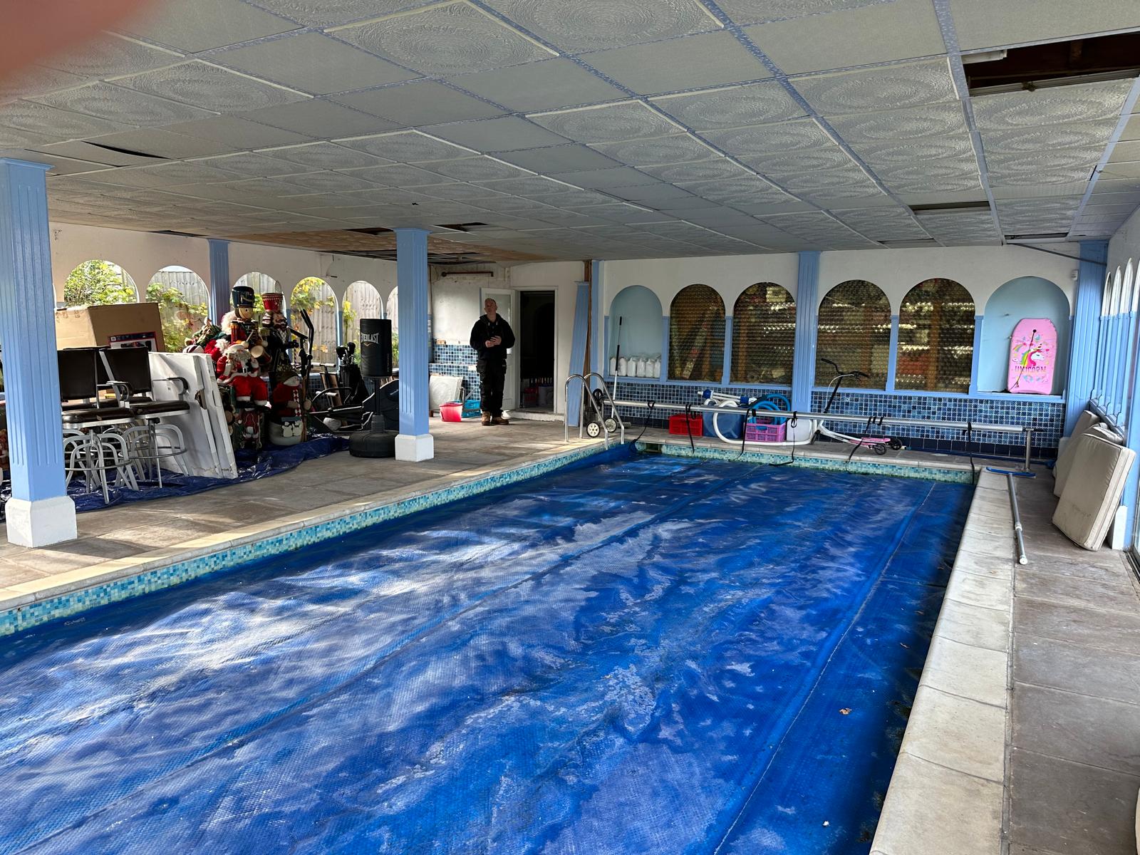 Before image of specialist scaffolding over swimming pool